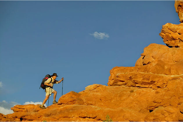 Hiker Rock Ledge Canyonlands Utah